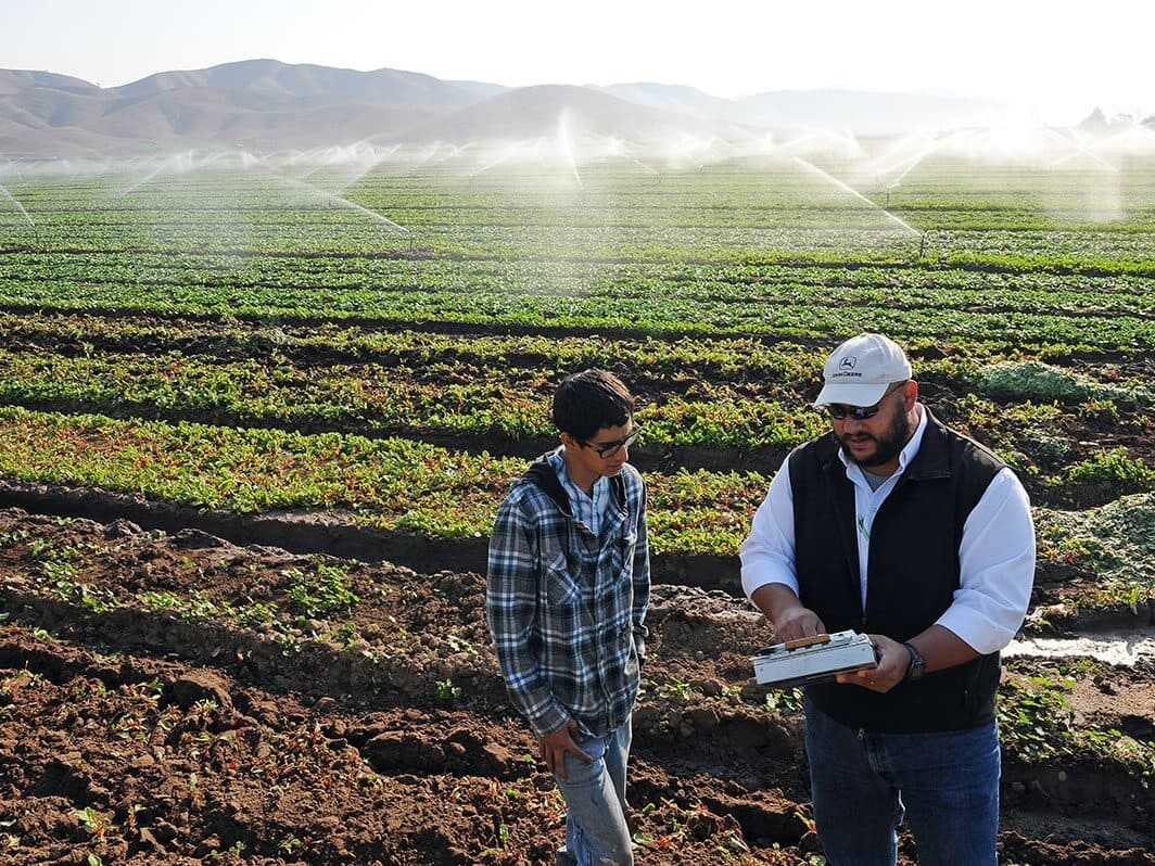 Demonstrating HeavyConnect's mobile platform in the field with irrigation management